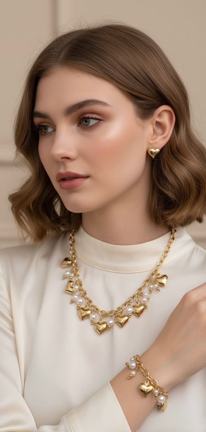 Collana sonaglio con cuori e perle in acciaio inox 316l