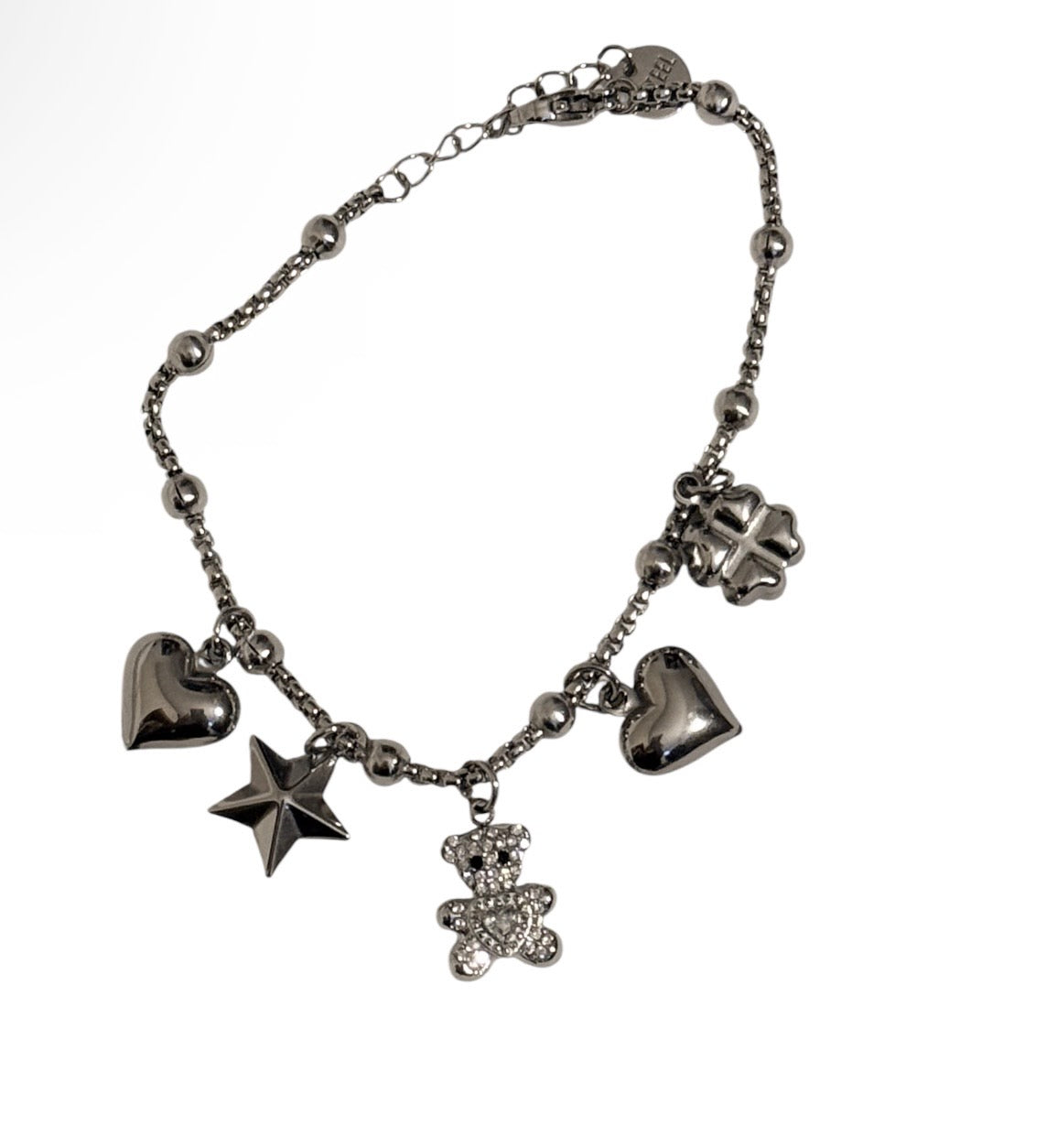 Bracciale Teddy sonaglio acciaio 316l con cuori e stella elegante e resistente