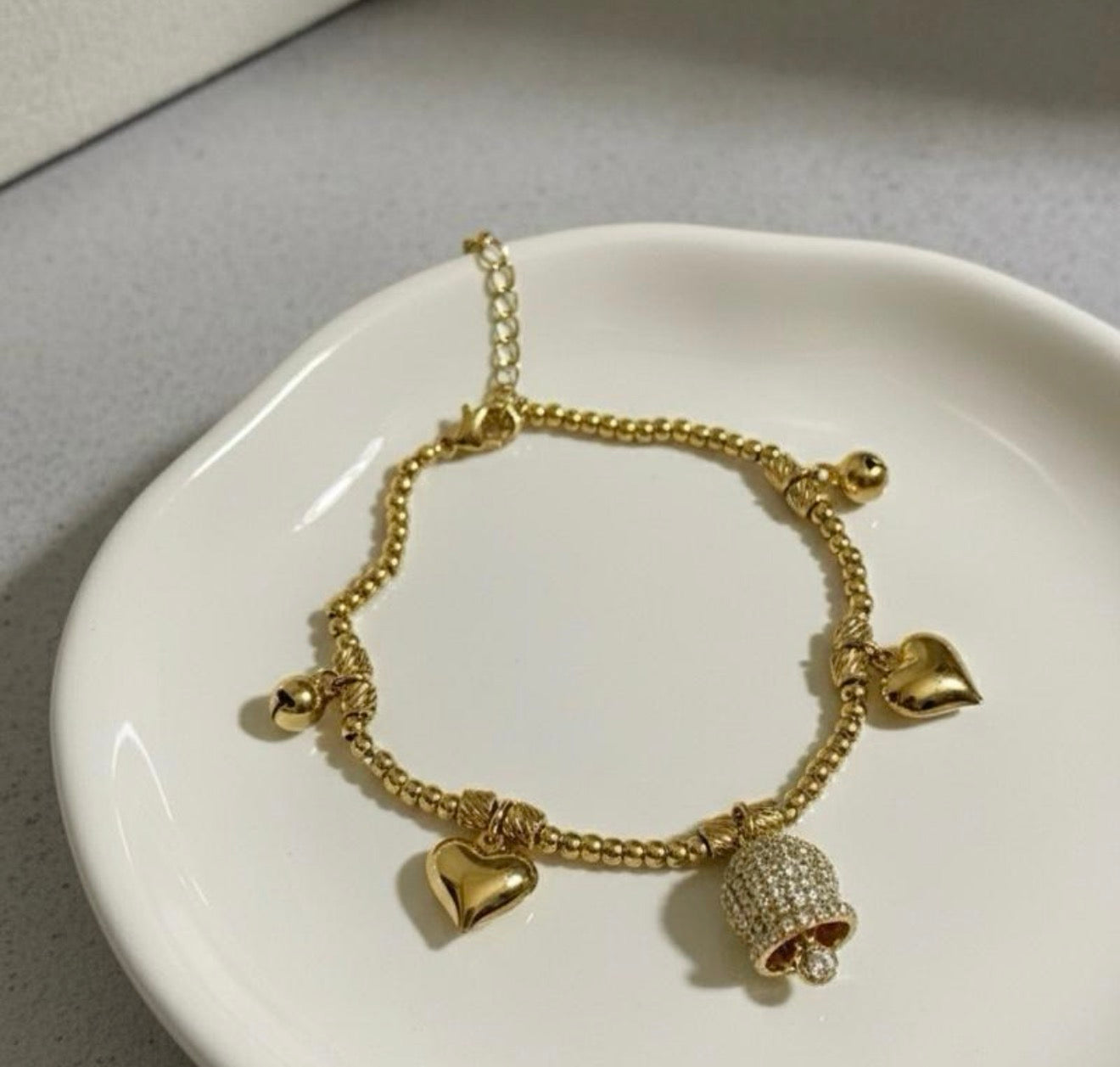 Bracciale sonaglio con campanella strass e cuori